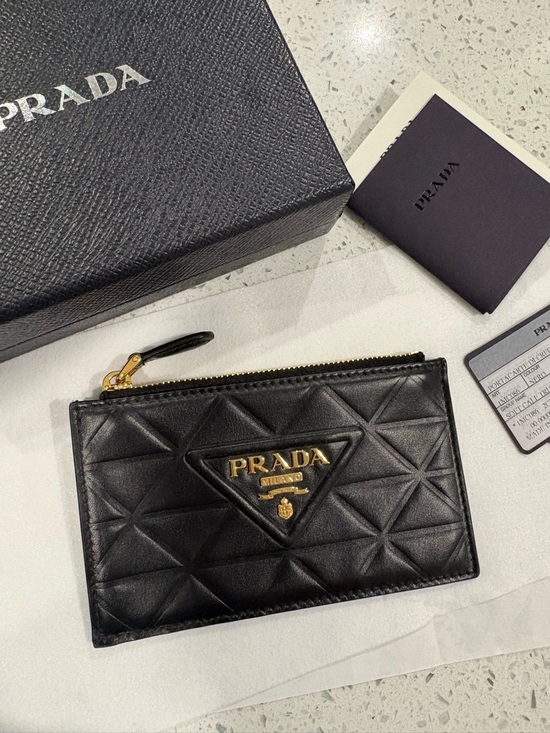 Prada Handbags - Prada Black Quilted Leather Zip Card wallet with Gold Logo